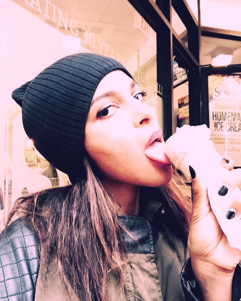 Megalyn Echikunwoke licking an icecream penis