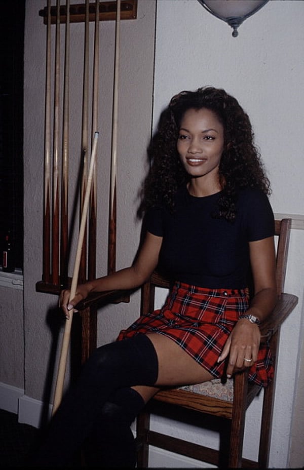 Young Garcelle Beauvais in plaid skirt