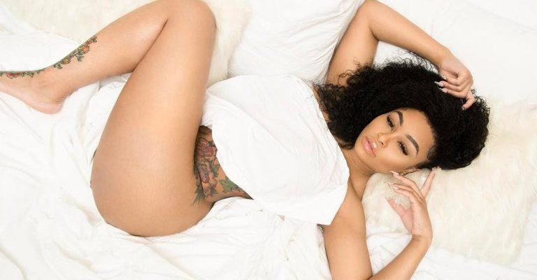 Blac Chyna naked under white sheets