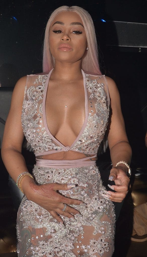 BlacChyna nips showing in sparkly dress