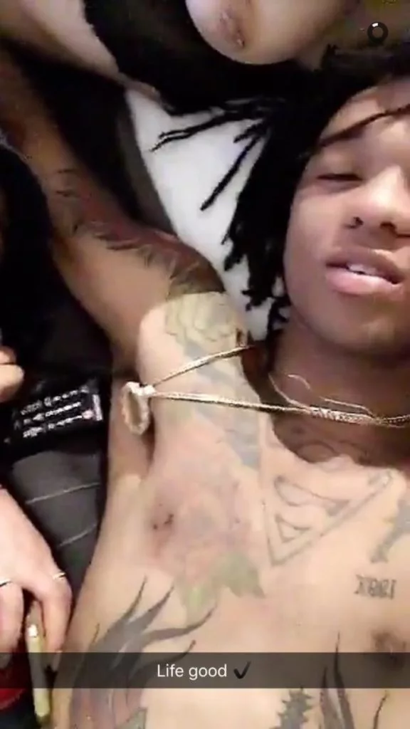 rapper Swae Lee snapchat video pic of him with a groupie and her boob showing